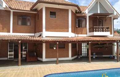 Imagem: A casa em condomínio possui 4 Dormitórios, 3 Banheiros, 5