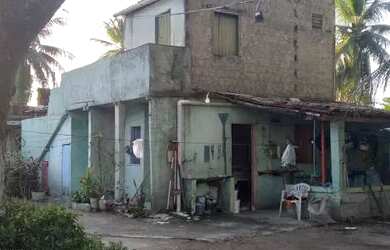 Imagem: A casa possui 3 Dormitórios, 2 Banheiros e 5 Vagas na garagem