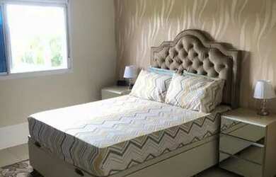 Imagem: A casa possui 3 Dormitórios, 3 Banheiros, 4 Vagas na garagem