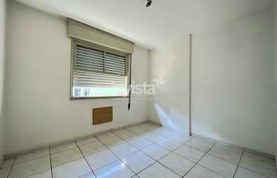 Imagem: O apartamento possui 1 Dormitório, 1 Banheiro, 1 Vaga na garagem