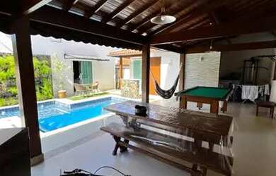 Imagem: A casa possui 3 Dormitórios, 3 Banheiros, 2 Vagas na garagem