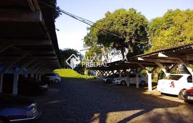 Imagem: O apartamento possui 1 Dormitório, 1 Banheiro, 1 Vaga na garagem