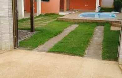 Imagem: A casa possui 2 Dormitórios, 3 Banheiros, 2 Vagas na garagem