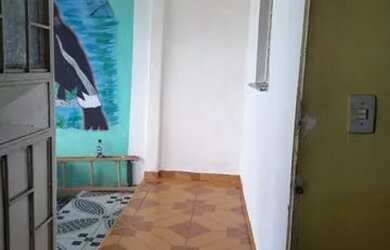 Imagem: A casa possui 2 Dormitórios, 1 Banheiro e 1 Vaga na garagem