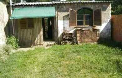 Imagem: A casa possui 2 Dormitórios, 1 Banheiro, 3 Vagas na garagem