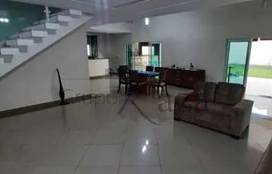 Imagem: A casa possui 3 Dormitórios, 4 Banheiros, 3 Vagas na garagem