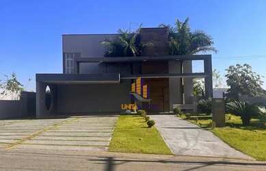 Imagem: A casa em condomínio possui 5 Dormitórios, 5 Banheiros, 5