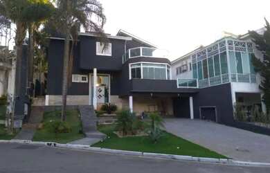 Imagem: A casa em condomínio possui 4 Dormitórios, 5 Banheiros, 3