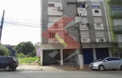 Imagem: O apartamento possui 3 Dormitórios, 1 Banheiro, 1 Vaga na garagem