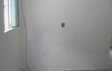 Imagem: A casa possui 2 Dormitórios e 1 Vaga na garagem e está localizado