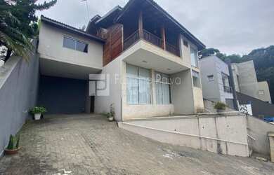 Imagem: A casa em condomínio possui 4 Dormitórios, 5 Banheiros, 3