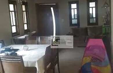 Imagem: A casa possui 3 Dormitórios, 4 Banheiros, 2 Vagas na garagem