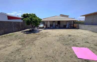 Imagem: A casa possui 2 Dormitórios, 2 Banheiros, 5 Vagas na garagem