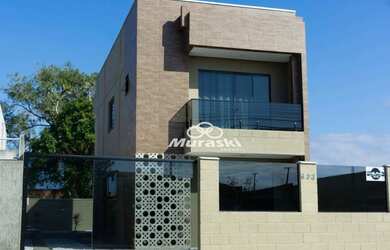 Imagem: A casa possui 3 Dormitórios, 2 Banheiros, 3 Vagas na garagem