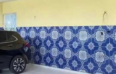 Imagem: A casa possui 3 Dormitórios, 3 Banheiros, 3 Vagas na garagem