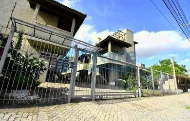 Imagem: A casa possui 2 Dormitórios, 2 Banheiros, 1 Vaga na garagem