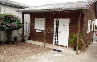 Imagem: A casa possui 4 Dormitórios, 3 Banheiros, 3 Vagas na garagem