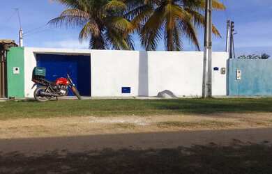 Imagem: A casa possui 3 Dormitórios, 3 Banheiros, 4 Vagas na garagem