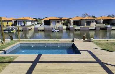 Imagem: A casa em condomínio possui 4 Dormitórios, 4 Banheiros, 2