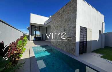 Imagem: A casa possui 3 Dormitórios, 5 Banheiros, 3 Vagas na garagem