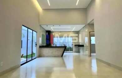 Imagem: A casa possui 3 Dormitórios, 2 Banheiros, 2 Vagas na garagem