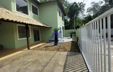 Imagem: A casa em condomínio possui 4 Dormitórios, 4 Banheiros, 2