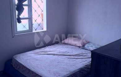 Imagem: A casa possui 4 Dormitórios, 1 Banheiro, 1 Vaga na garagem