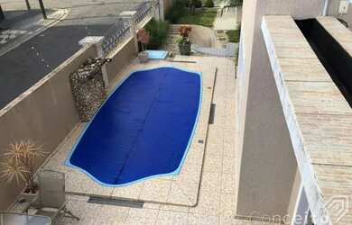 Imagem: A casa possui 4 Dormitórios, 3 Banheiros, 4 Vagas na garagem