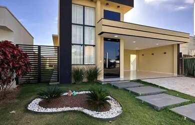 Imagem: A casa possui 3 Dormitórios, 4 Banheiros, 4 Vagas na garagem