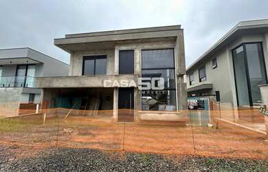 Imagem: A casa em condomínio possui 4 Dormitórios, 5 Banheiros, 4