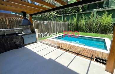 Imagem: A casa em condomínio possui 4 Dormitórios, 5 Banheiros, 2