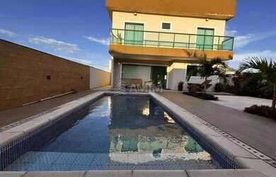 Imagem: A casa possui 4 Dormitórios, 1 Banheiro, 5 Vagas na garagem