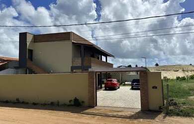 Imagem: A casa possui 5 Dormitórios, 5 Banheiros, 5 Vagas na garagem