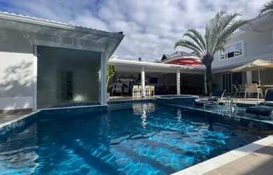 Imagem: A casa em condomínio possui 4 Dormitórios, 5 Banheiros, 4