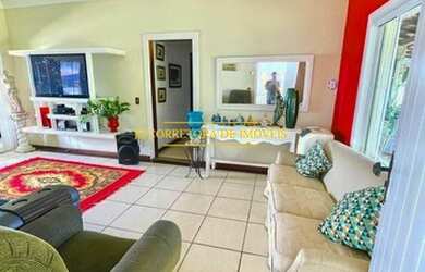 Imagem: A casa possui 3 Dormitórios, 3 Banheiros, 2 Vagas na garagem