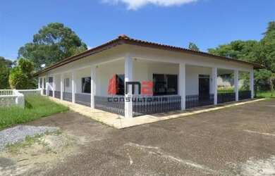 Imagem: A casa possui 4 Dormitórios, 5 Banheiros, 5 Vagas na garagem