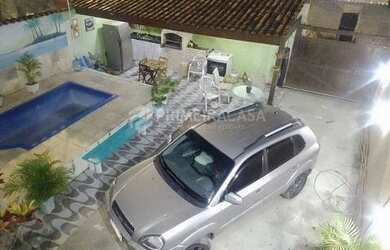 Imagem: A casa possui 3 Dormitórios, 4 Banheiros, 3 Vagas na garagem