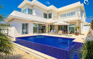 Imagem: A casa possui 3 Dormitórios, 5 Banheiros, 5 Vagas na garagem