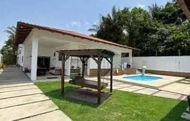 Imagem: A casa possui 5 Dormitórios, 5 Banheiros, 5 Vagas na garagem