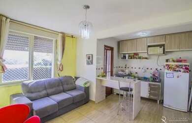 Imagem: O apartamento possui 2 Dormitórios, 1 Banheiro, 1 Vaga na garagem