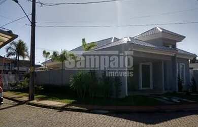 Imagem: A casa em condomínio possui 3 Dormitórios, 3 Banheiros, 2