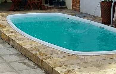 Imagem 1: Casa de Veraneio. Piscina, Churrasqueira, 2 Vagas na garageme2 Dormitórios