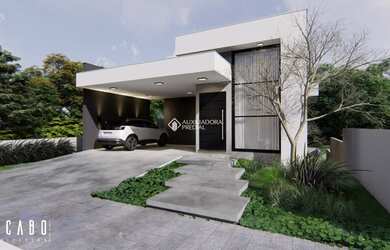 Imagem: A casa possui 3 Dormitórios, 2 Banheiros, 2 Vagas na garagem