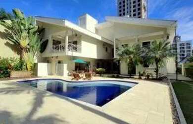 Imagem: A casa possui 5 Dormitórios, 5 Banheiros, 5 Vagas na garagem