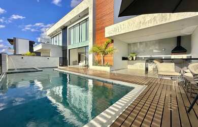 Imagem: A casa em condomínio possui 4 Dormitórios, 5 Banheiros, 4