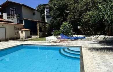 Imagem: A casa possui 5 Dormitórios, 4 Banheiros, 3 Vagas na garagem