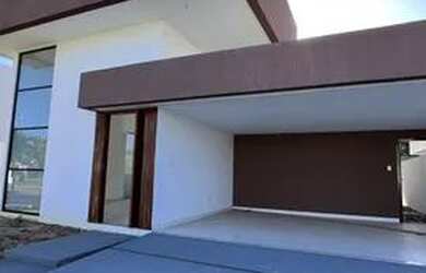 Imagem: A casa possui 3 Dormitórios, 4 Banheiros, 3 Vagas na garagem