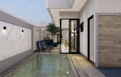 Imagem: A casa possui 3 Dormitórios, 2 Banheiros, 2 Vagas na garagem