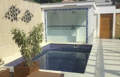 Imagem: A casa em condomínio possui 4 Dormitórios, 4 Banheiros, 3