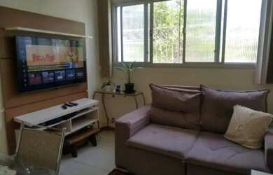 Imagem: O apartamento possui 2 Dormitórios, 1 Banheiro, 1 Vaga na garagem